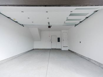 An garage room with a white wall and ceiling